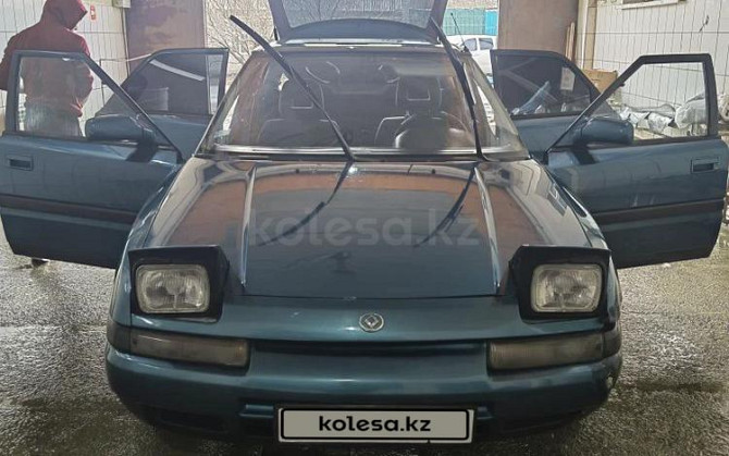 Mazda 323, 1992, 1.6 л, 438000 км Кызылорда - изображение 1