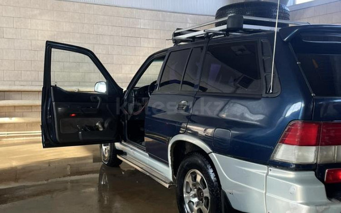 SsangYong Musso, 1997, 2.3 л,  км Сатпаев - изображение 4