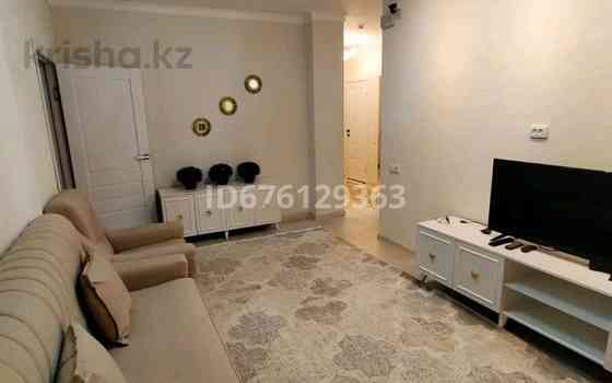 2-комнатная квартира посуточно, 65 м², 6/16 этаж, мкр Нурсат 2 / Байдибек би Shymkent