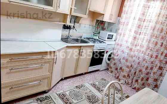 2-комнатная квартира посуточно, 60 м², 1/9 этаж, мкр Малый Самал, Кунаеава 63 / Мадели кожа Shymkent