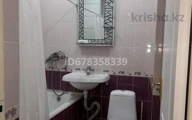 2-комнатная квартира посуточно, 60 м², 1/9 этаж, мкр Малый Самал, Кунаеава 63 / Мадели кожа Шымкент - изображение 6