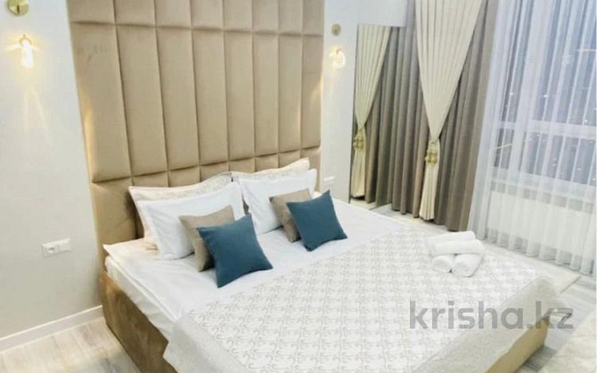 2-комнатная квартира посуточно, 78 м², 9/16 этаж, Байтерекова 100/4 / МЕТРО Акимат Шымкент - изображение 1