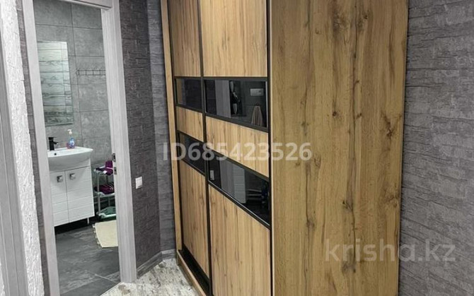 2-комнатная квартира посуточно, 54 м², 12/16 этаж, мкр Нурсат 2 / Новый акимат Shymkent - photo 5