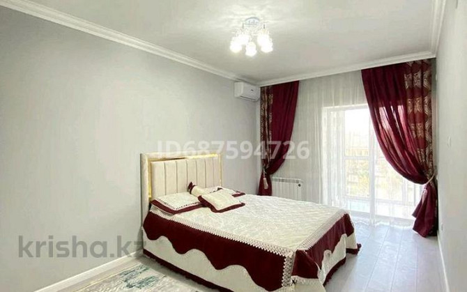 2-комнатная квартира посуточно, 70 м², 3/12 этаж, мкр Нурсат 2, Арғынбекова 9 / Шаяхметов Shymkent - photo 1