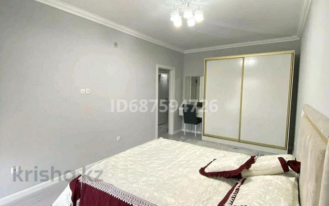 2-комнатная квартира посуточно, 70 м², 3/12 этаж, мкр Нурсат 2, Арғынбекова 9 / Шаяхметов Shymkent - photo 2