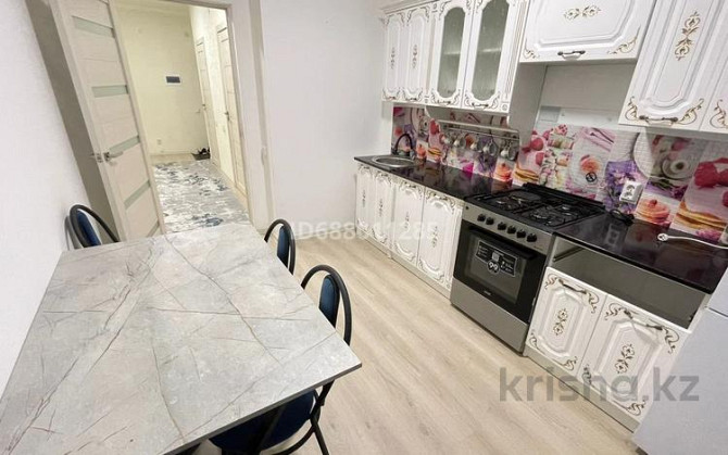 2-комнатная квартира посуточно, 62 м², 5/9 этаж, мкр Нурсат 2, Аргынбекова 19/1 / Аргынбекова шаяхме Shymkent - photo 4
