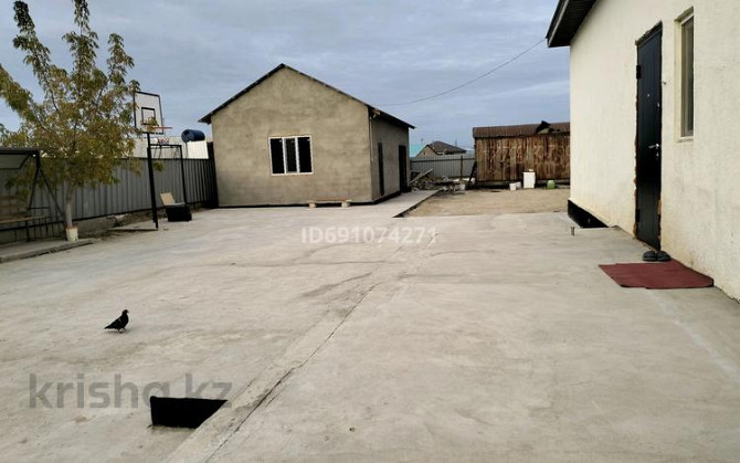 4-комнатный дом продажа, 169 м², 12 соток, Мустафа Шоқай 7 - 4 мкр 4-домның алдында орналасқан Өркен Кульсары - изображение 4