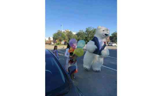 Поздравление от белого медведя Атырау